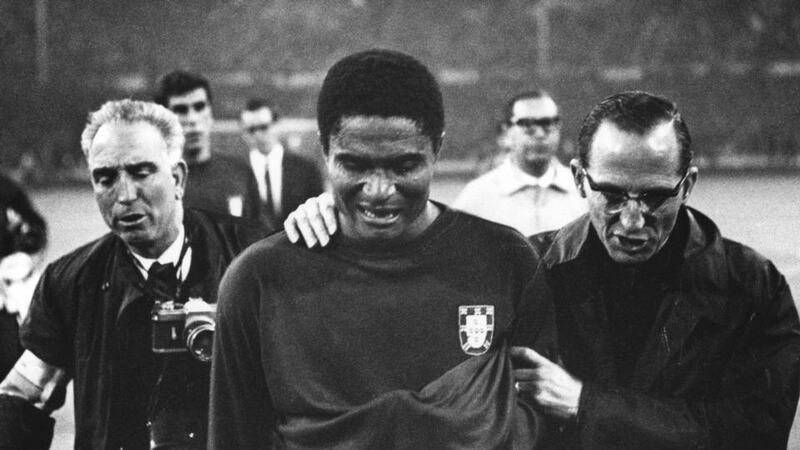 A file image of Eusebio leaving the pitch in tears after Portugal lost the 1966 World Cup semi final 2-1 to England.  Photograph: Getty