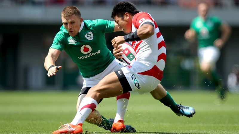 Ireland’s Andrew Conway in action with Japan’s Ryuji Noguchi  at Ajinomoto Stadium  in  Tokyo last year. Photograph: Ryan Byrne/Inpho