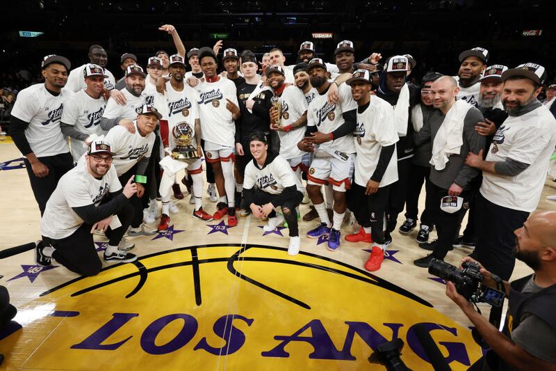 Members of the Denver Nuggets pose with the Western Conference Championship Trophy following their victory against the Los Angeles Lakers in game four of the Western Conference Finals at Crypto.com Arena in Los Angeles, California. Photograph: Harry How/Getty Images