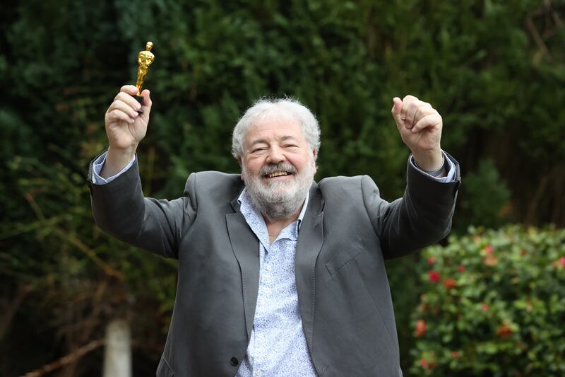 James Martin's father Ivan Martin at their family home in south Belfast with a miniature Oscar statuette after An Irish Goodbye won the Oscar for best live action short film at this year's Academy Awards. Photograph: Liam McBurney/PA