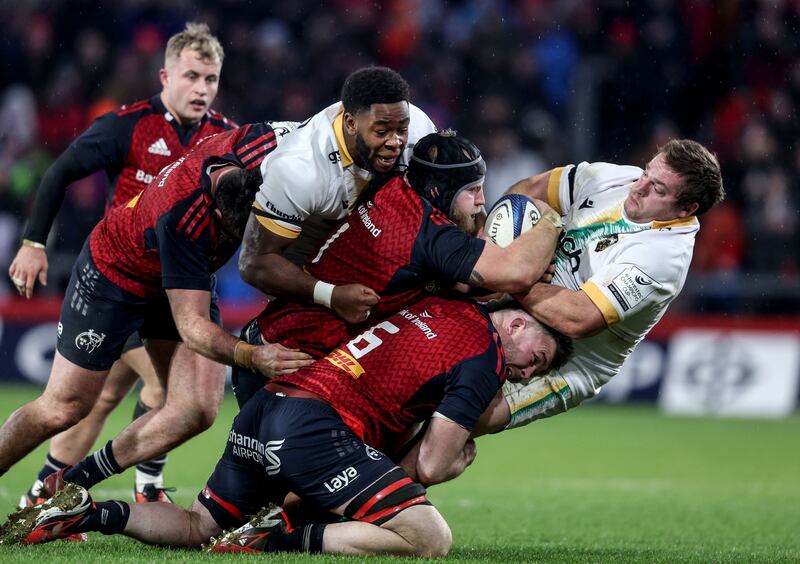 Munster’s Jeremy Loughman and Peter O’Mahony  in action against  Emmanuel Iyogun and Elliot Millar-Mills of Northampton. Photograph: Dan Sheridan/Inpho 
