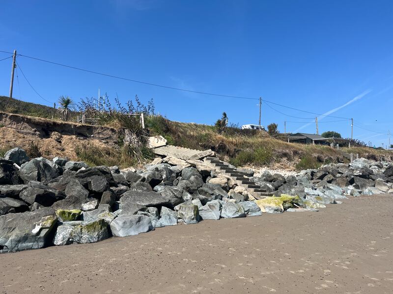 A buckled set of steps that Bill Kelly used to walk down to access the beach at Rosslare Strand just a year ago. Photograph: Steven Carroll
