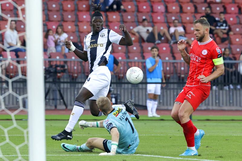 Shelbourne goalkeeper Conor Kearns saves the effort of Fernand Goure of FC Zurich. Photograph: Marc Schumacher/Inpho