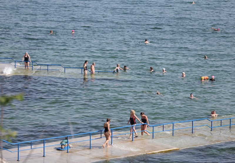 Early morning bathers take to the sea at Seapoint near Blackrock in south Co Dublin. Photograph: Bryan O’Brien/The Irish Times