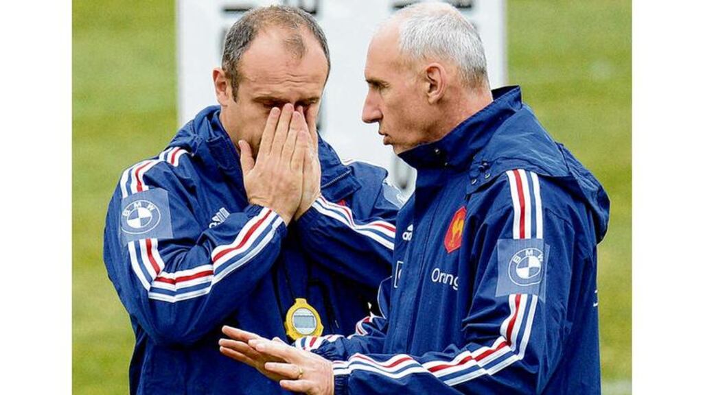 France's head coach Philippe Saint-Andre (left) reacts next to assistant coach Patrice Lagisquet during a training session in Marcoussis, south of Paris. yesterday. photograph: franck fife/afp/getty images)