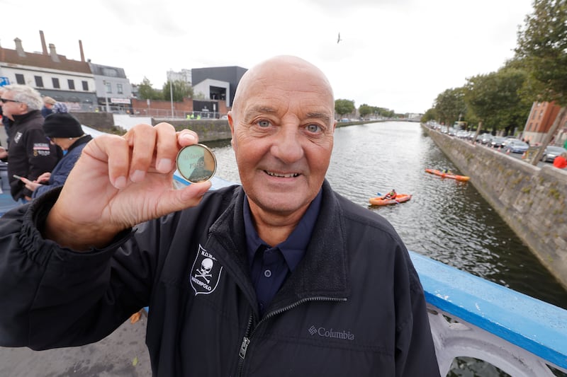 Derek Wilkes before Saturday's 105th annual Dublin Liffey Swim with the medal he received when winning the 1989 race. His day got much better as he went on to win once again. It was the 55th time he took part in the race. Photograph: Alan Betson / The Irish Times.
