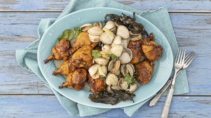 Korean drumsticks, sweet and sour clams. Photograph: Harry Weir