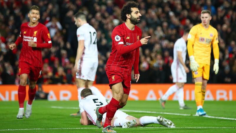 Mohamed Salah  celebrates after scoring  Liverpool’s first goal against Sheffield United at Anfield. Photograph:   Clive Brunskill/Getty Images