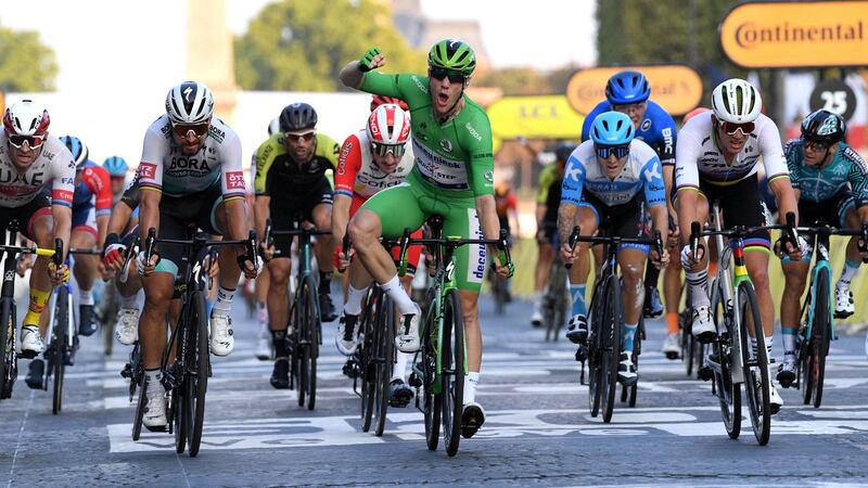 Sam Bennett celebrates winning the green jersey at the 2020 Tour de France finale in Paris. Photograph: Faugere Franck/Inpho