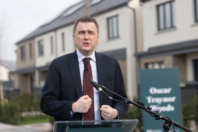 Minister for Housing James Browne speaks to the media at the completion of some of the houses in the Oscar Woods development on Wednesday. Photo: Sam Boal/Collins