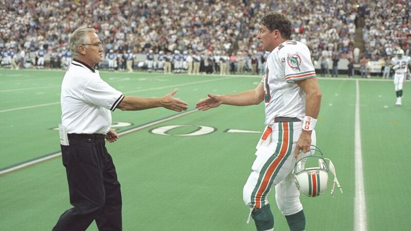 Miami Dolphins head coach Don Shula shakes hands with quarterback Dan Marino after a game against the Indianapolis Colts in 1995. Photograph:   Jonathan Daniel/Allsport