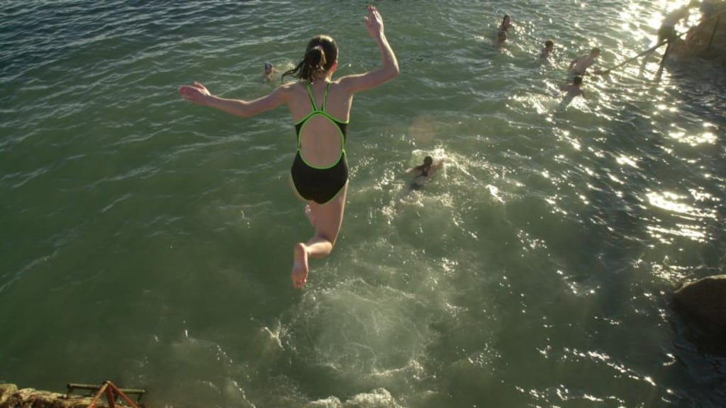 Taking the plunge at the Forty Foot in Dublin on Christmas morning for the annual Christmas Day Swim. Photograph: Frank Miller