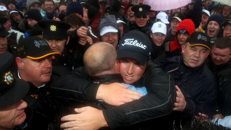 Lowry embracing his father Brendan on the 18th green in Baltray after winning the Irish Open in 2009. Photograph: Cathal Noonan/Inpho