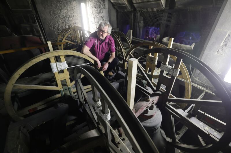 Raymond Cregan, master bell ringer at Christ Church Cathedral, inspecting the belfry. Photograph: Alan Betson
