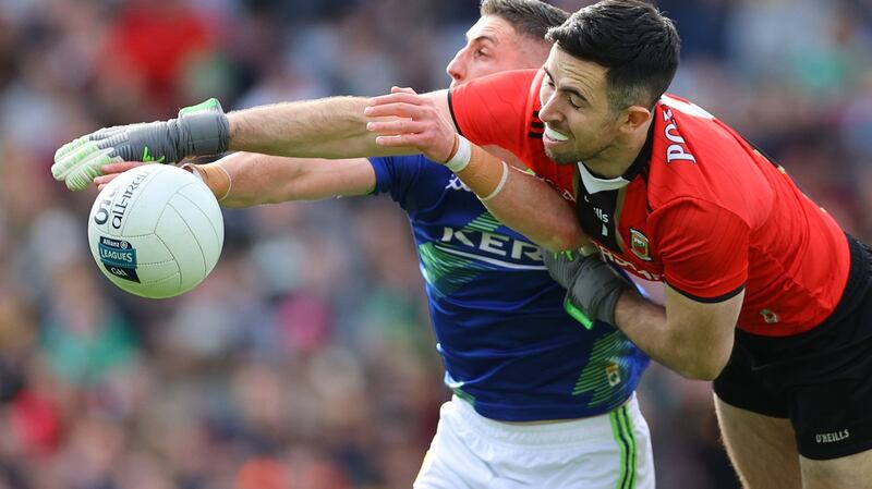 Kerry’s Paul Geaney is challenenged by Mayo goalkeeper Rory Byrne  during the  Allianz Football League Division One  Final at  Croke Park. Photograph: James Crombie/Inpho