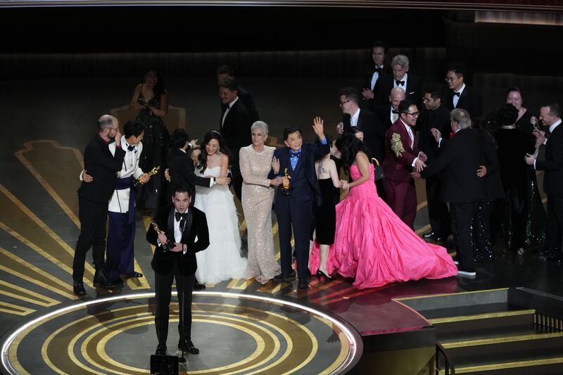 Jonathan Wang speaks after Everything Everywhere All at Once wins the award for best picture. Photograph: Todd Heisler/The New York Times