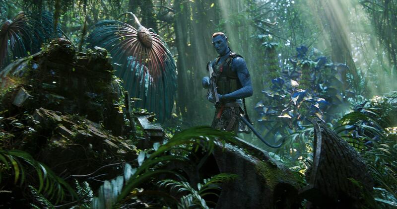 Welcome to the jungle: Quaritch goes for a nature walk in Avatar: The Way of Water. Photograph: 20th Century Studios.