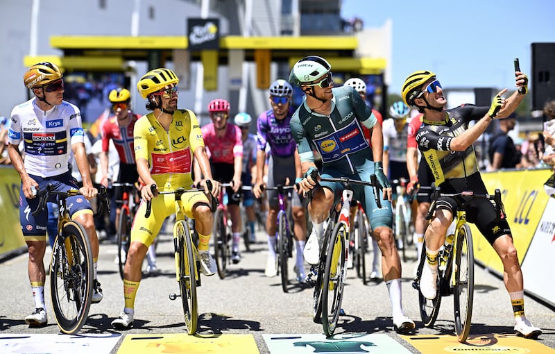 Remco Evenepoel (white), Ben Healy (yellow) and Jonathan Milan (green) at the start of the 11th stage of the 2025 Tour de France. Photograph: Jasper Jacons/BELGA MAG/AFP via Getty Images