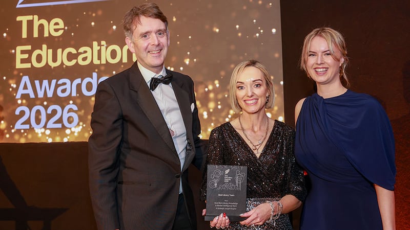 Rory O'Boyle, awards judge, presents the best library team award to Mairéad Mc Keown and Lauren Sneyd, Bord Bia's Library, Knowledge and Market Intelligence team