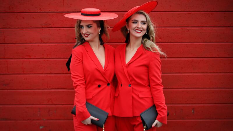 Twins Dawn and Davinia Knight from Portarlington, Co Offaly, on the fourth day of the  Punchestown Festival 2018 in Naas, Co Kildare. Photograph: James Crombie/Inpho