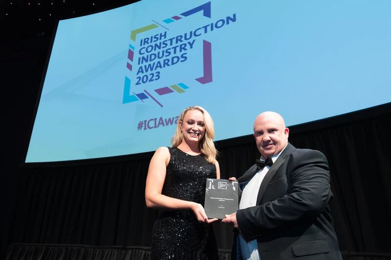 Amy Kruse, awards judge, presents the apprenticeship programme award to Donal Johnson, Instrotec