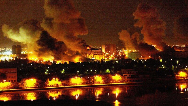 Fires burn in and around Saddam Hussein’s Council of Ministers during the first wave of attacks in the ‘shock and awe’ phase of ‘Operation Iraqi Freedom’ on March 21st, 2003 in Baghdad, Iraq. Photograph: Mirrorpix/Getty Images