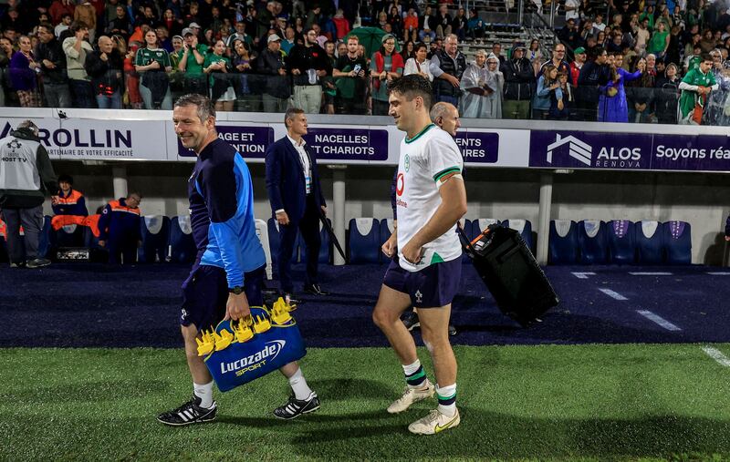 Ireland’s Jimmy O’Brien with physio Robbie Fox after the game. Photograph: Dan Sheridan/Inpho
