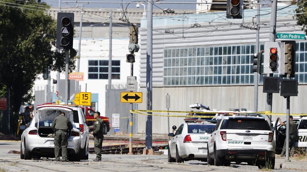 Police and investigators at the scene of the shooting at the San Jose Valley Transportation Authority light railyard in San Jose, California on May 26th. Photograph: John G Mabanglo/EPA