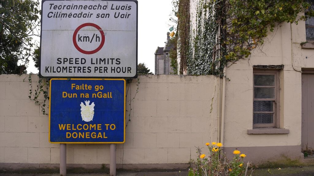 A Border sign in Pettigo, Co Donegal: a shared-space arrangement would enable a shared civil and commercial life, while preserving  current political identities. Photograph: Clodagh Kilcoyne/Reuters