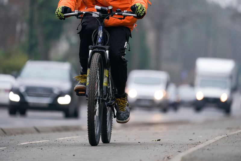 Every kilometre you choose to cycle instead of drive saves approximately 250g of CO2 emissions. Photograph: Jacob King/PA Wire 