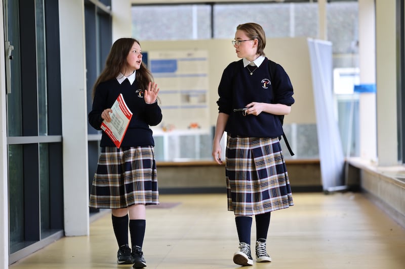 Students discussing their exams at Trinity Comprehensive School, Ballymun, Dublin.
Photograph: Dara Mac Dónaill