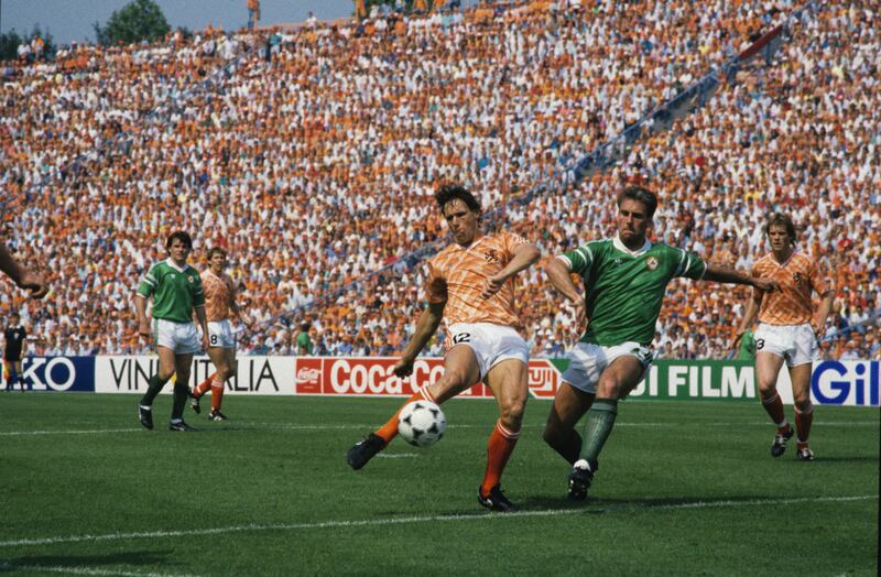 Mick McCarthy challenges the Netherlands' Marco van Basten during the Euro 88 clash at the Parkstadion in Gelsenkirchen, Germany. Wim Kieft's late goal gave the Dutch a 1-0 victory and they went on to win the tournament. Photograph: VI Images via Getty Images