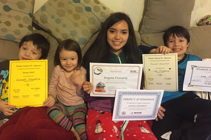 Emmett Fitzpatrick, Fiona Fitzpatrick, Angela Finnerty and Liam Fitzpatrick show off their school awards