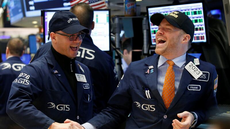 Traders celebrate on the main trading floor of the New York Stock Exchange (NYSE) as the Dow Jones Industrial Average passes the 20,000 mark shortly after the opening of the trading session in New York, U.S., January 25, 2017. REUTERS/Brendan McDermid     TPX IMAGES OF THE DAY Traders celebrate on the main trading floor of the New York Stock Exchange (NYSE) as the Dow Jones Industrial Average passes the 20,000 mark shortly after the opening of the trading session in New York, U.S., January 25, 2017. REUTERS/Brendan McDermid     TPX IMAGES OF THE DAY