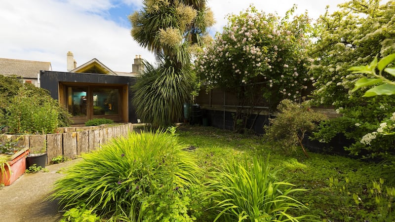 Horgan engaged architectural firm Donaghy and Dimond to redesign and extend the cottage