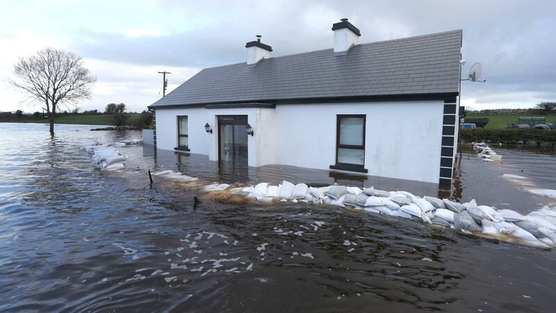 AFTER: The sandbag defences failed to stop Ann Conolly’s house from flooding at Ballinastague, Co Galway, December 30th, 2015. Photograph: Joe O’Shaughnessy