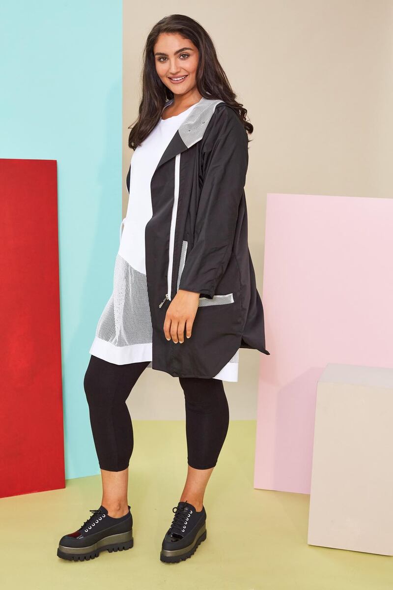 Hooded jacket with mesh pocket €190, tunic with mesh hemline €115