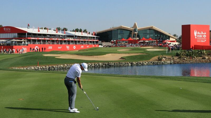 Rory McIlroy  plays his second shot on the 18th hole during round one of the Abu Dhabi HSBC Golf Championship. Photograph: Andrew Redington/Getty Images