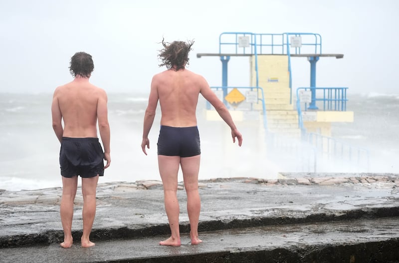 People by Blackrock diving tower in Salthill, Galway. Photograph: Brian Lawless/PA Wire