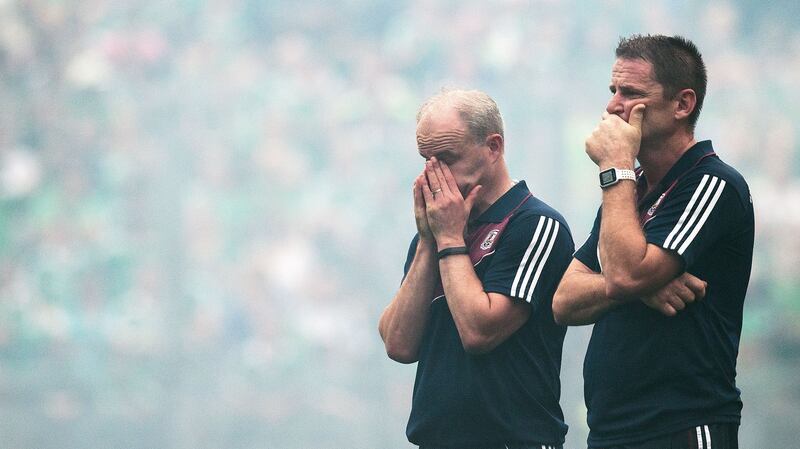 Micheal Donoghue and selector Noel Larkin at the end of the last year’s final. Photograph: Tommy Dickson/Inpho