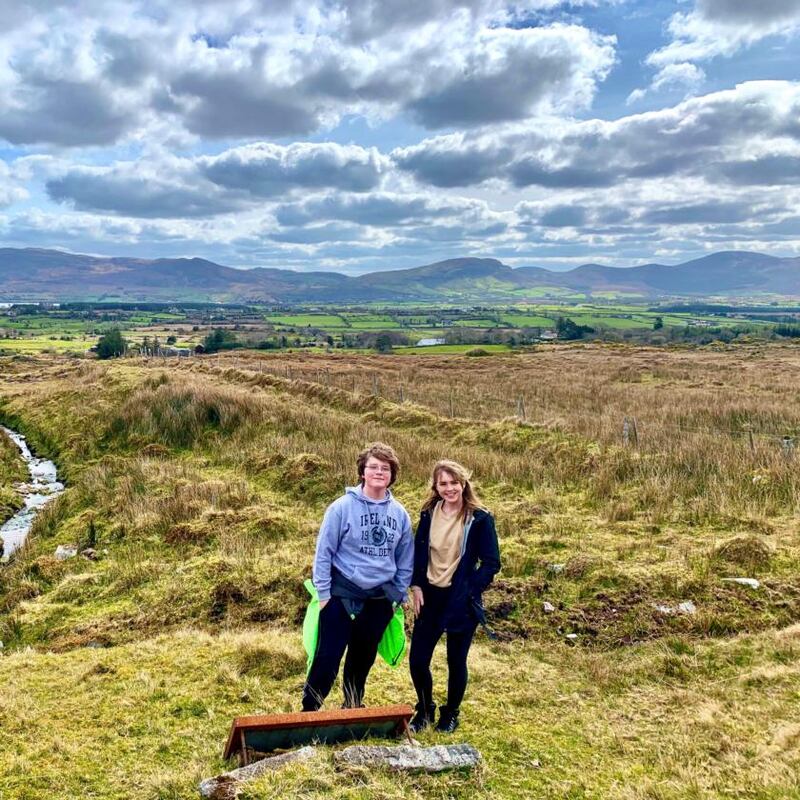 My children Finnegan (named for Nephin) and Moya at my father’s grave, 2019