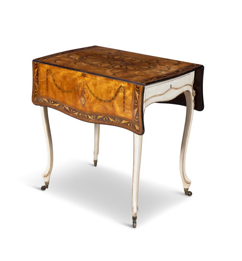 A George III satinwood and marquetry white painted table with decorated drop-leaf sides (€10,000-€15,000)
