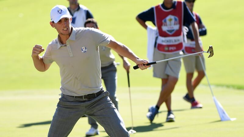 Thomas Pieters of Europe reacts after a putt on the 16th green to win the match. Photo: Ross Kinnaird/Getty Images