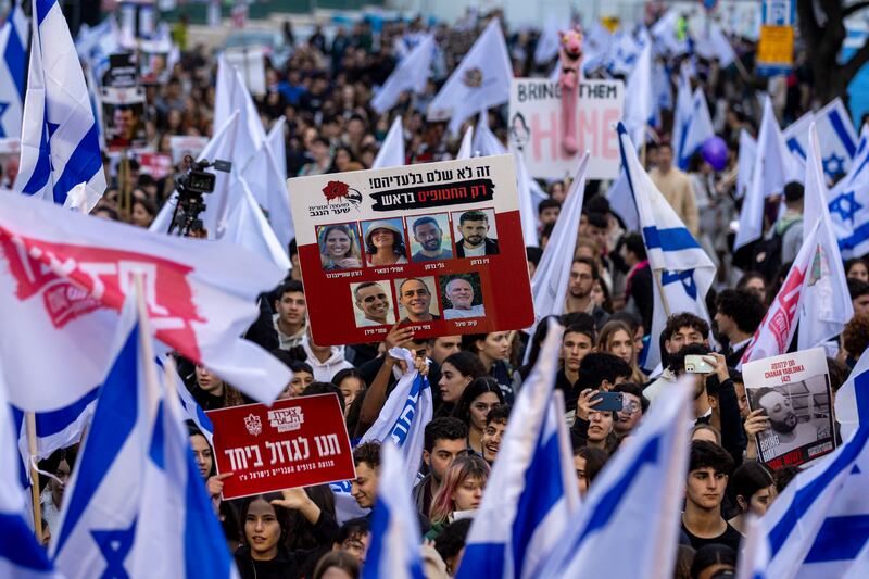 Israeli youth, led by Israeli Scouts from Kibbutz Kfar Aza, protest for the release of hostages held in Gaza. Photograph: Maja Hitij/Getty Images News
