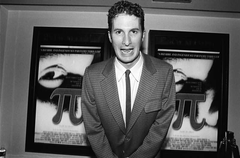 Darren Aronofsky poses at the premiere of his film Pi in June 1998 in New York. Photograph: Catherine McGann/Getty 