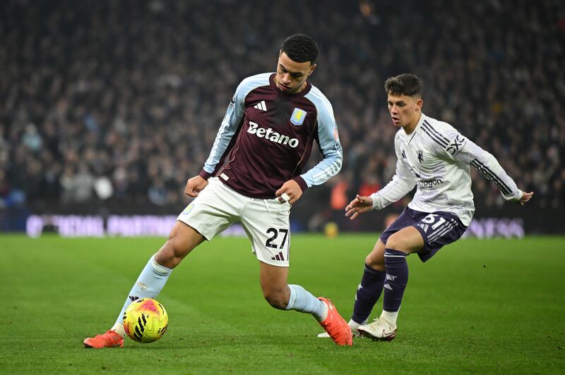 Morgan Rogers in action against Manchester United's Shea Lacey. Photograph: Clive Mason/Getty Images