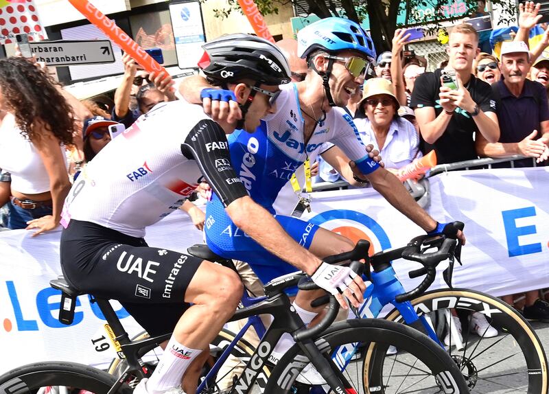Simon Yates of Team Jayco Alula congratulates his twin brother Adam Yates of UAE Team Emirates after the first stage of the Tour de France. Photograph: Pete Goding/Belga Mag/AFP via Getty Images