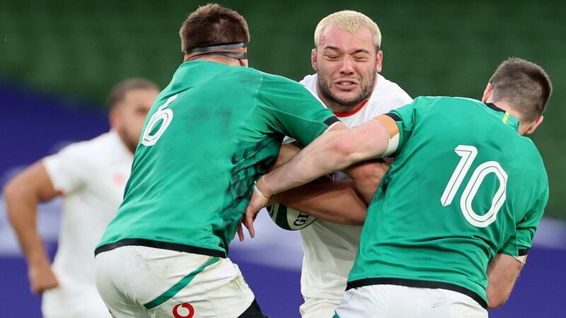 Ellis Genge is tackled by CJ Stander and Johnny Sexton during last year’s Six Nations clash at the Aviva Stadium.  Photograph: James Crombie/Inpho
