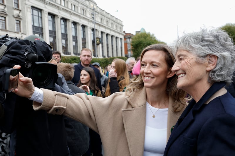 Holly Cairns, leader of the Social Democrats, takes a selfie with Connolly on O'Connell Street. Photograph: Conor O'Mearain/PA Wire 