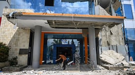 Rescue teams search for survivors in Indonesia after powerful earthquake